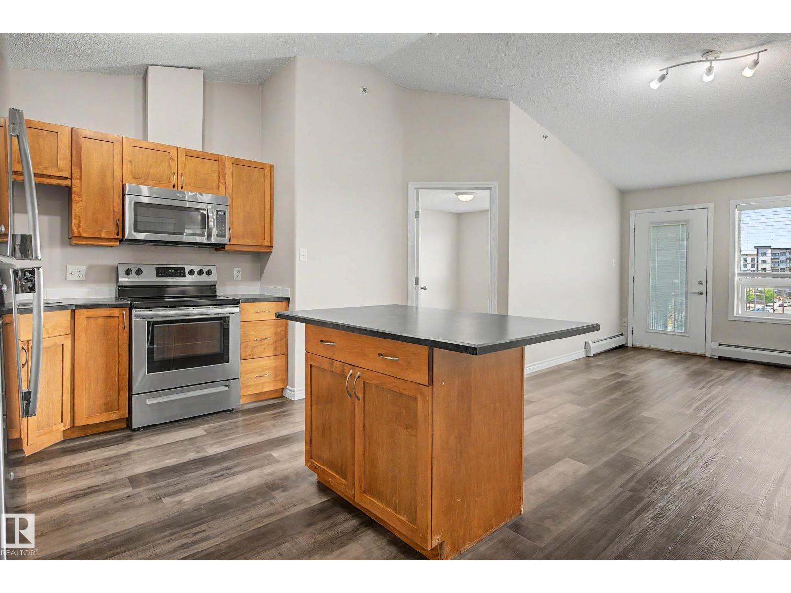 #1410 7339 SOUTH TERWILLEGAR DR NW - 12
