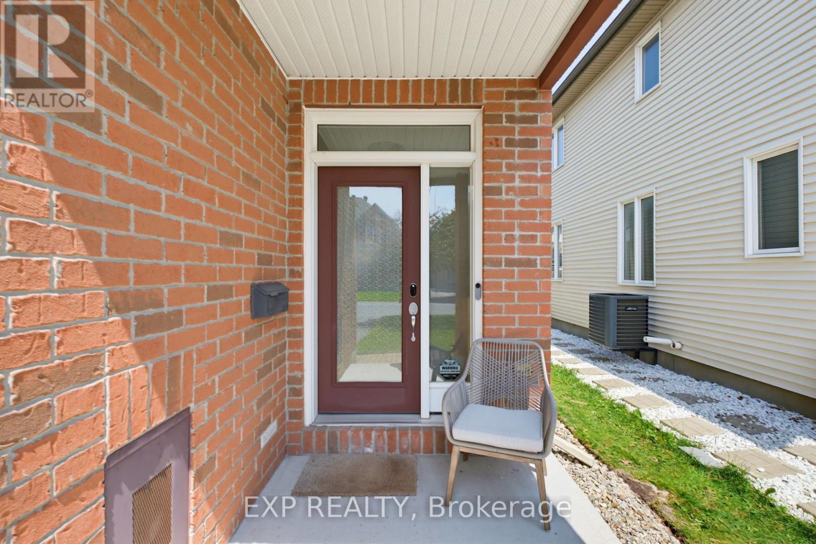 Front Entrance with Brick Detailing.