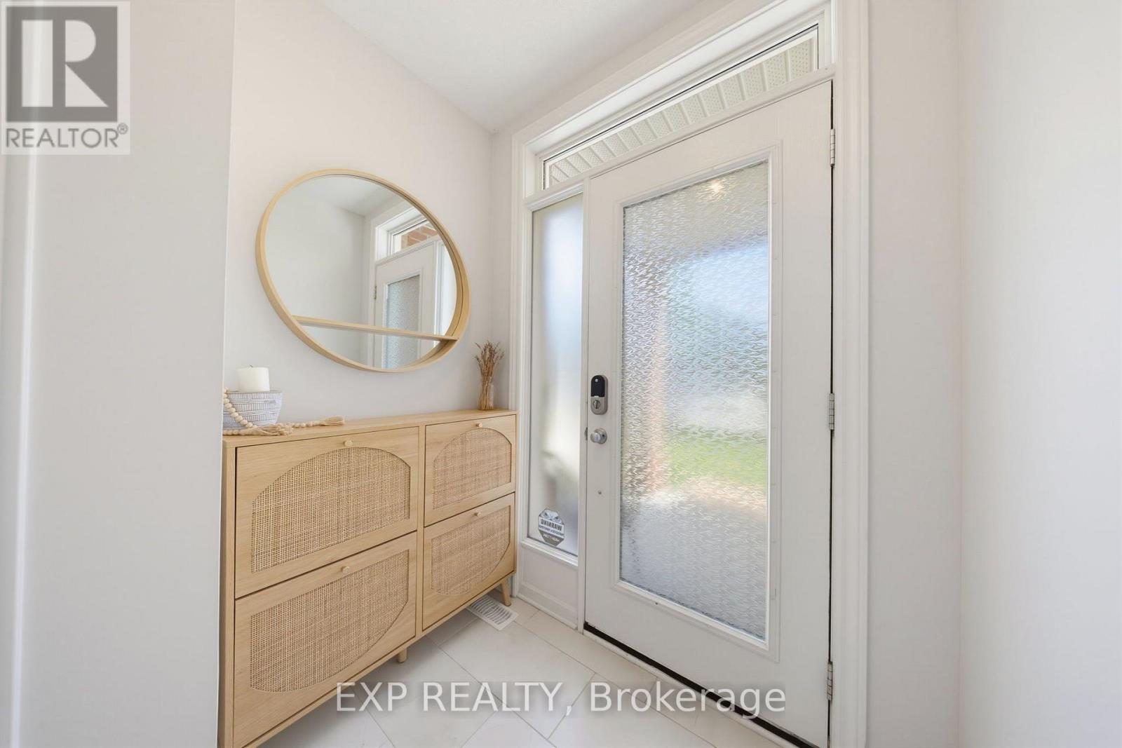 Bright And Welcoming Tiled Front Foyer.