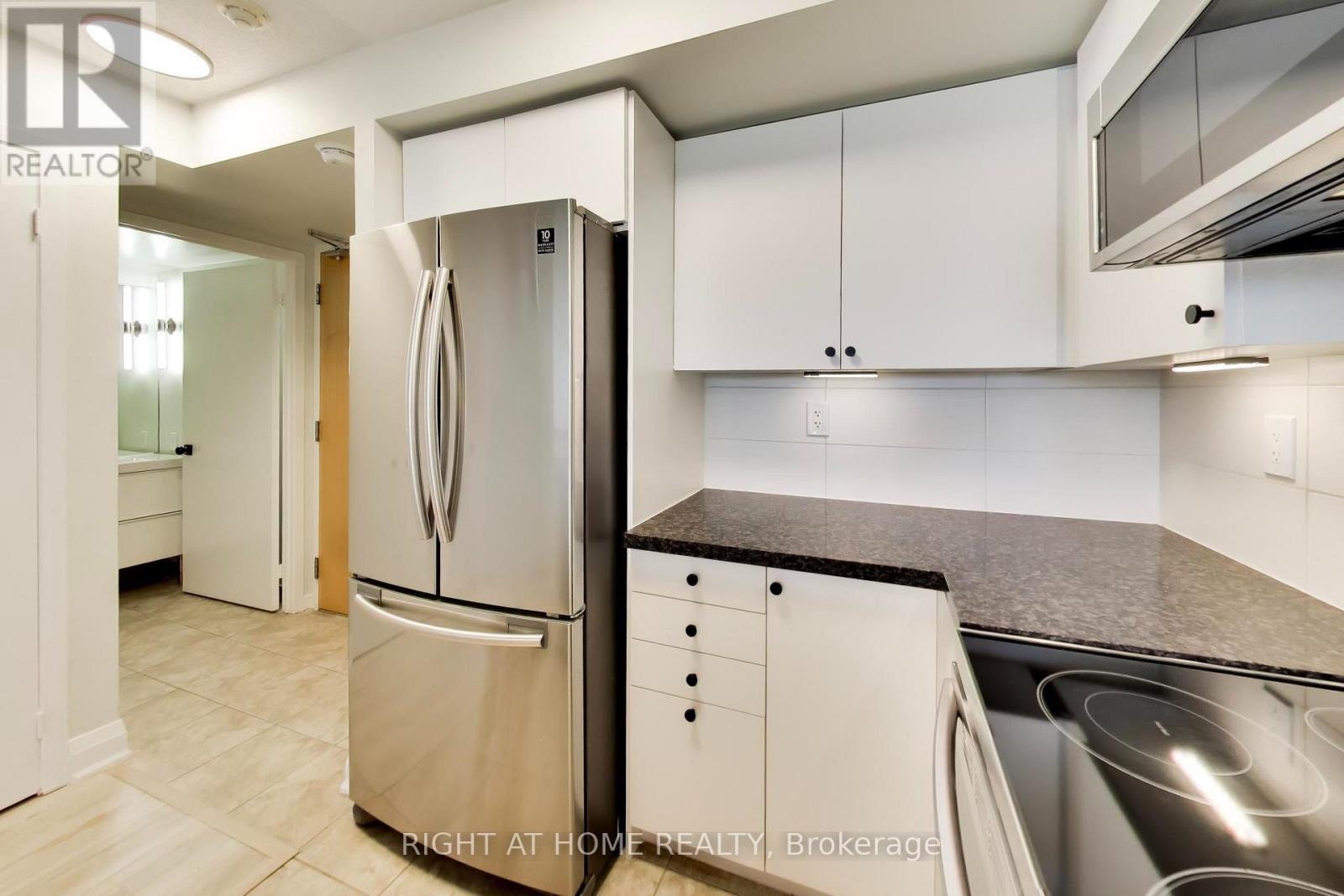 #407 1040 THE QUEENSWAY - Image 18
