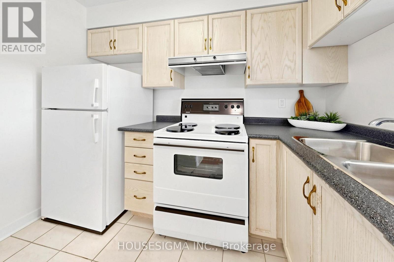 #401 3231 EGLINTON AVENUE E - 12