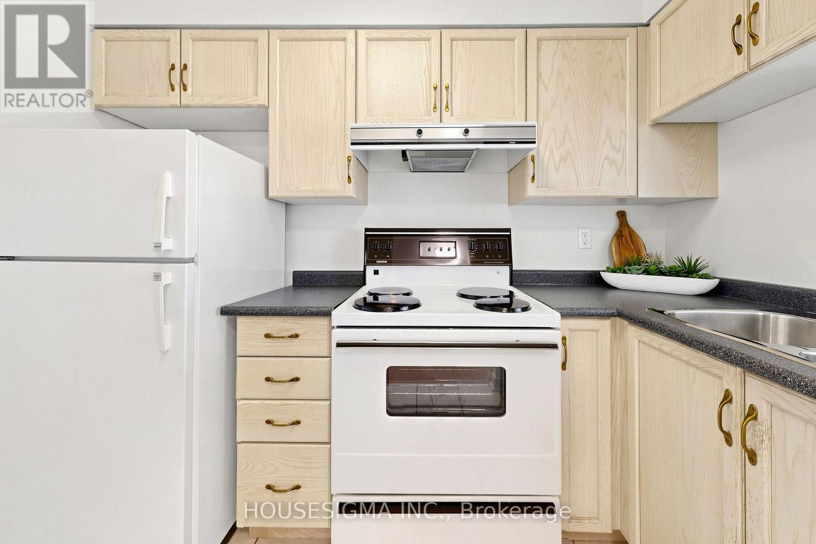#401 3231 EGLINTON AVENUE E - 13