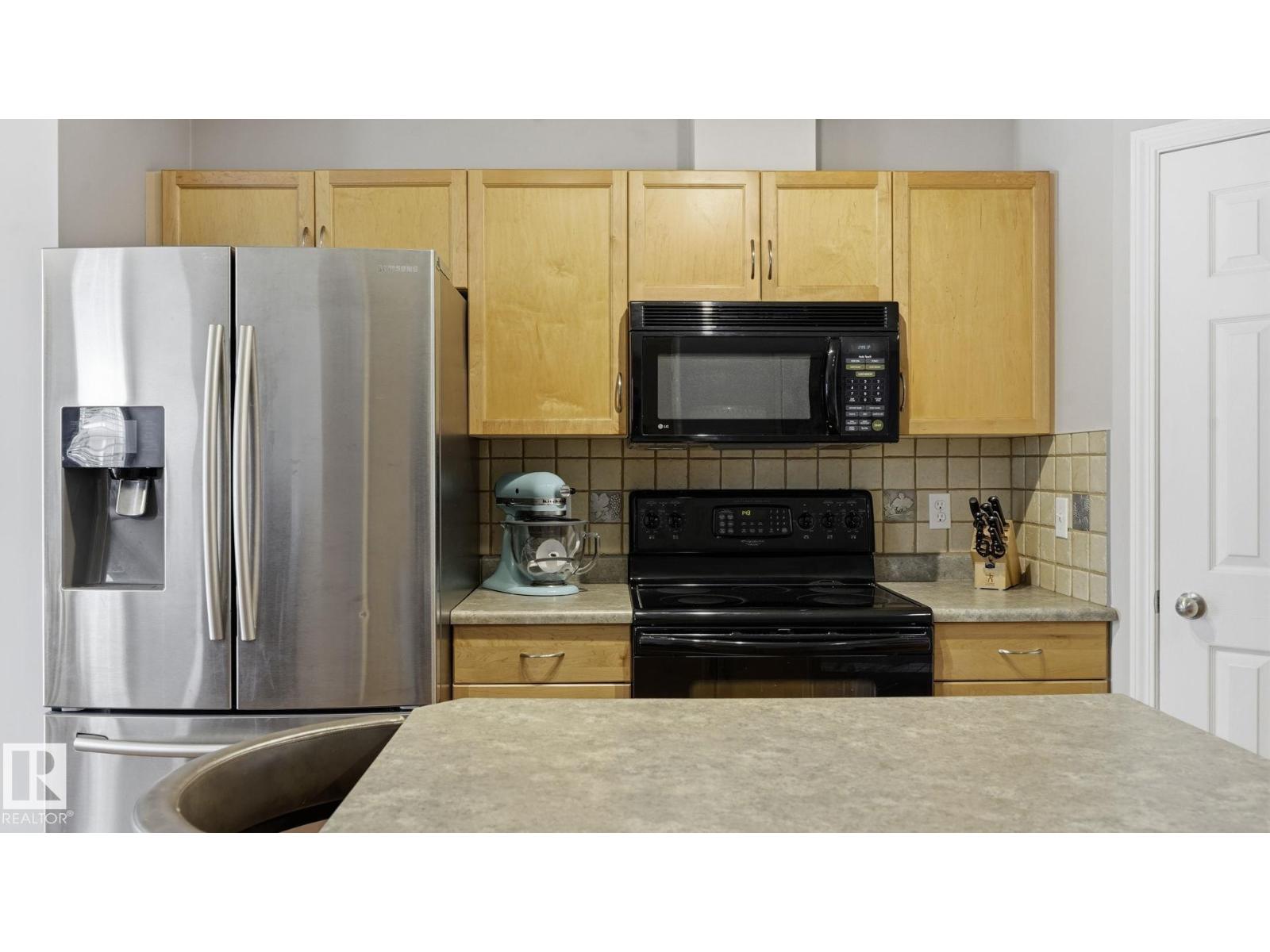 #58 8304 11 AV SW - 11