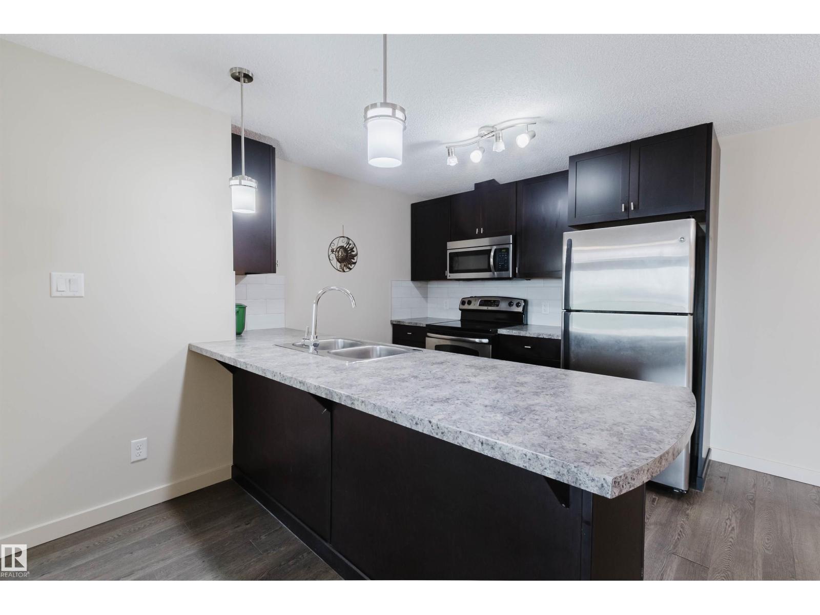 #304 6084 STANTON DR SW - 19