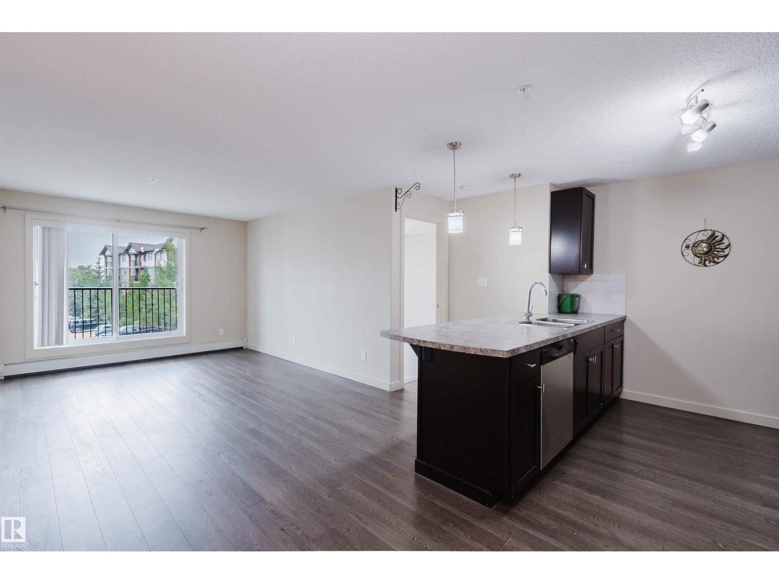 #304 6084 STANTON DR SW - 4