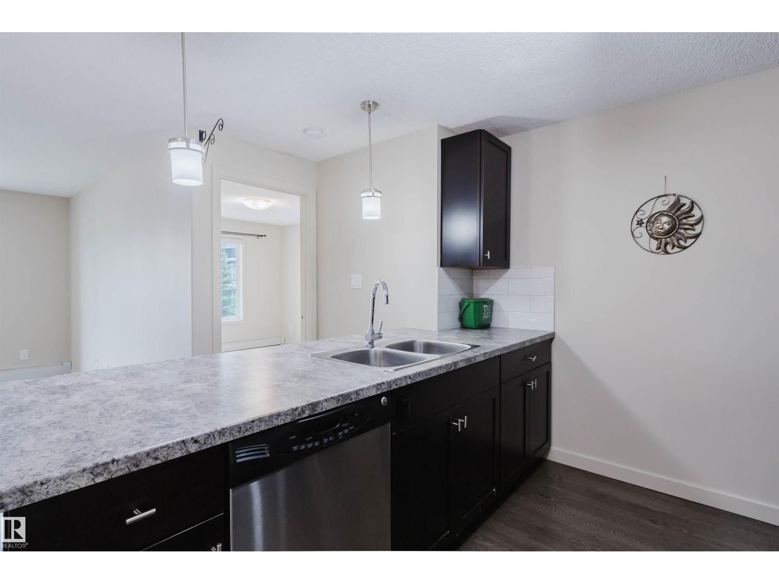 #304 6084 STANTON DR SW - 6