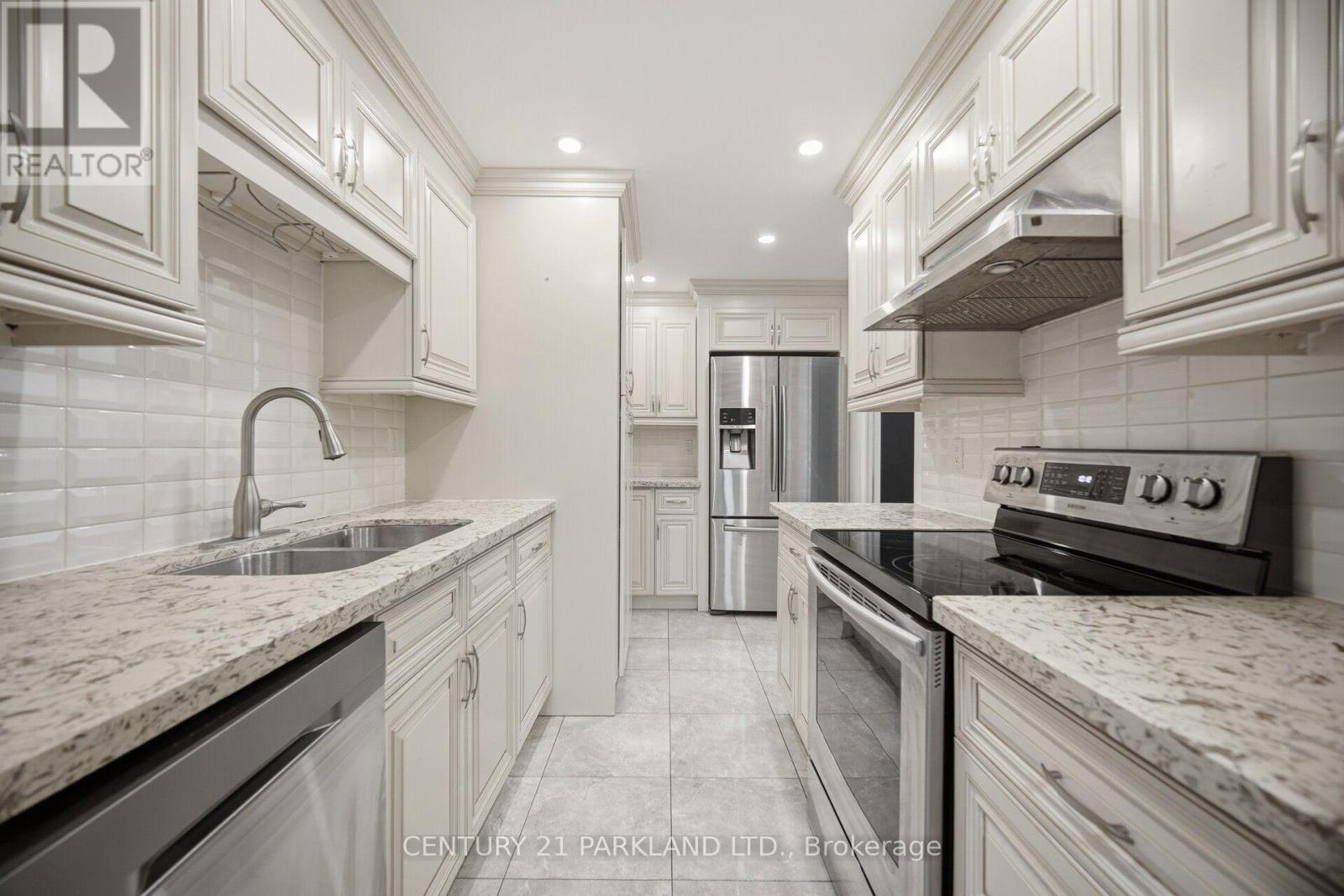 #203 2721 VICTORIA PK AVENUE - 12