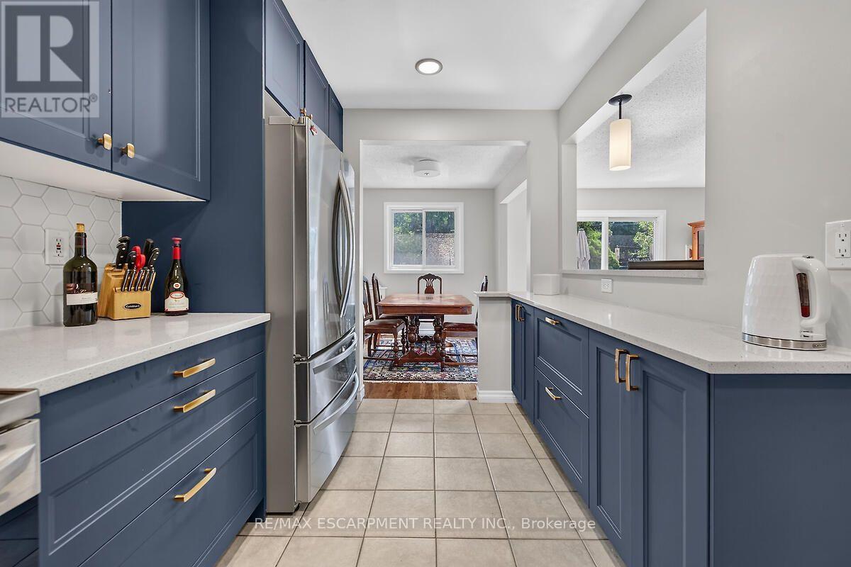 #24 300 REXFORD DRIVE - 13