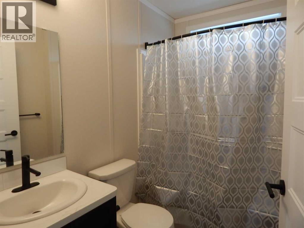 #11, 5210 65 Avenue - 27