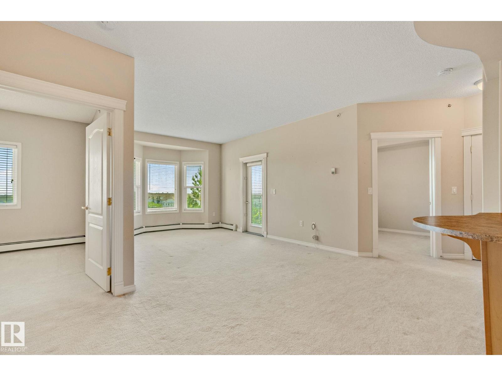 #418 14259 50 ST NW - 8