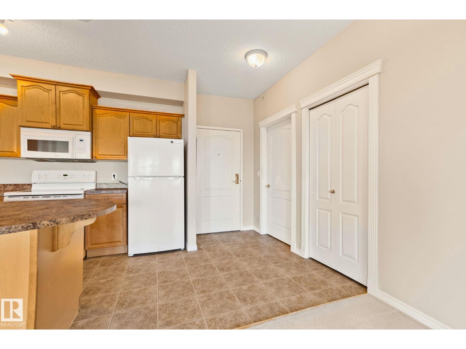 #418 14259 50 ST NW - 10