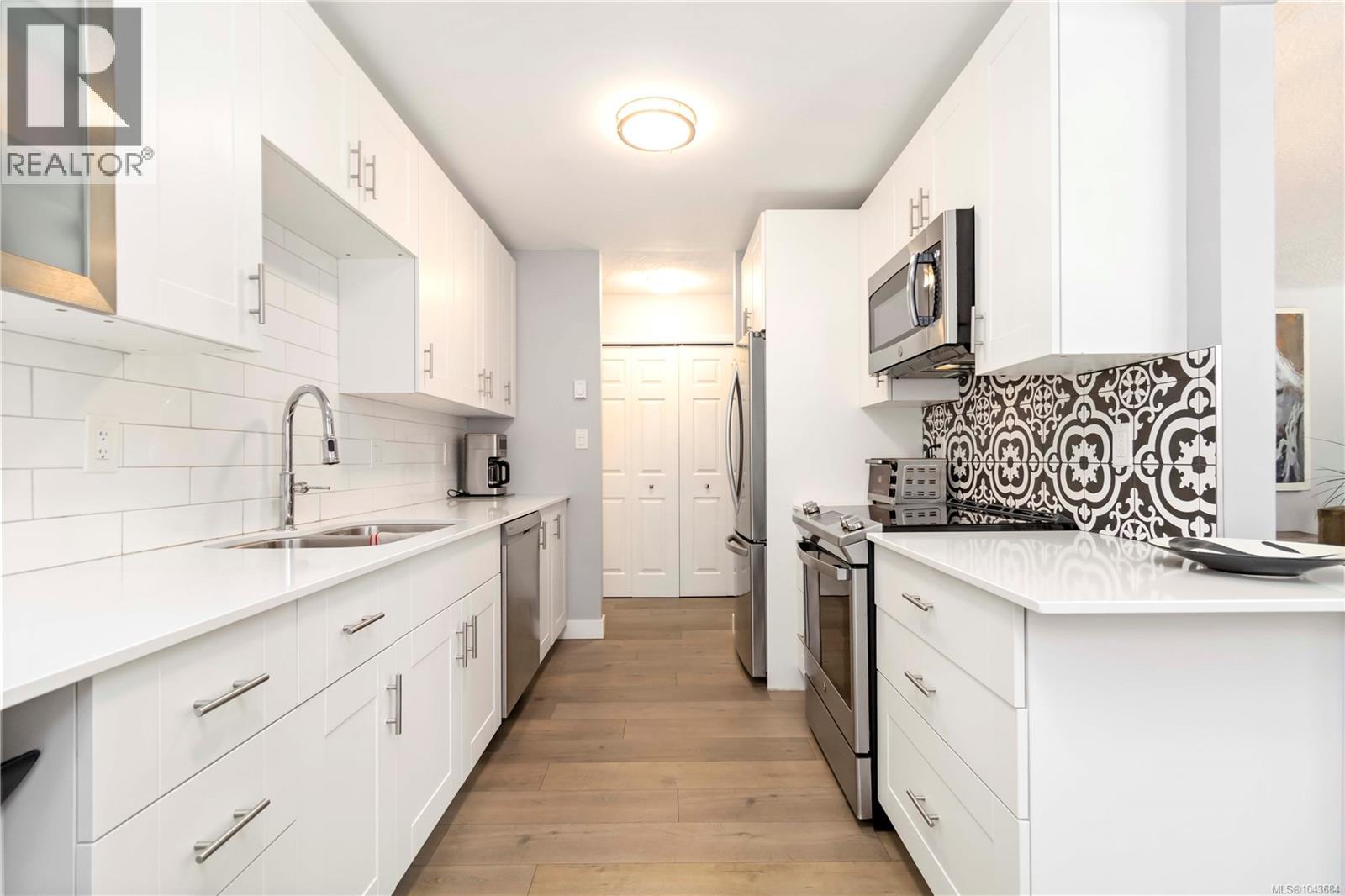 #203 9945 Fifth St - 2
