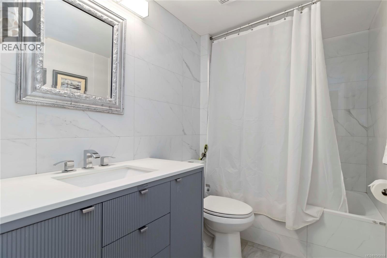 #203 9945 Fifth St - 23