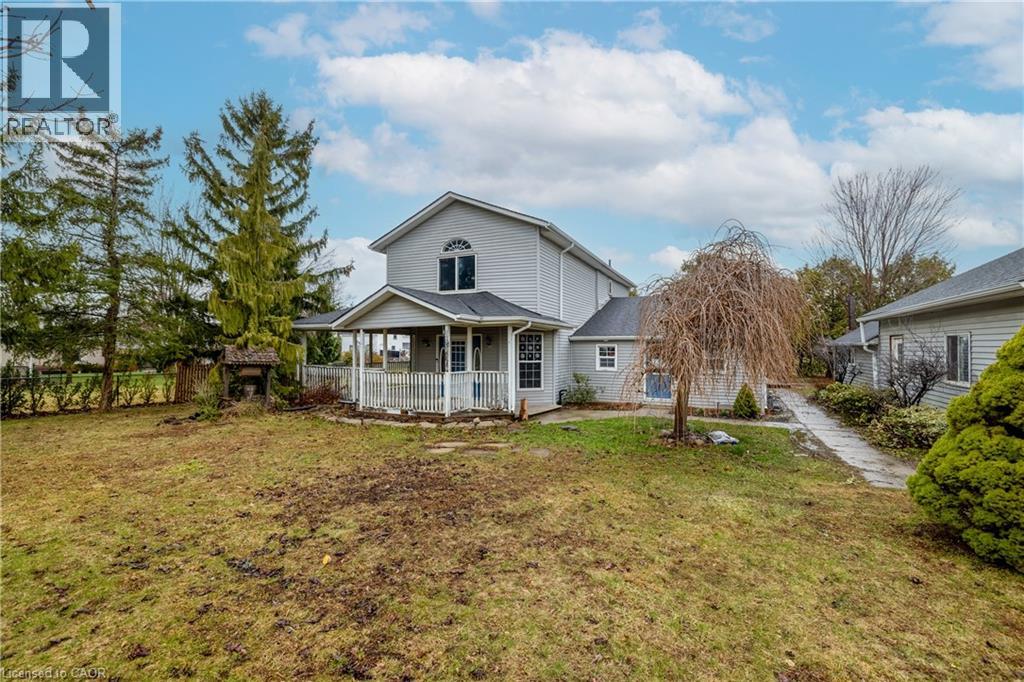 Rear view of property featuring a porch