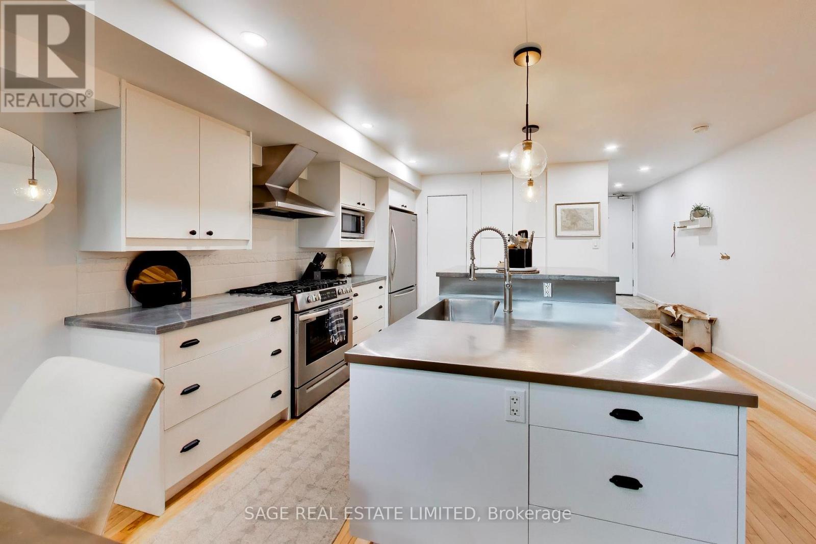 #111 660 PAPE AVENUE - 2