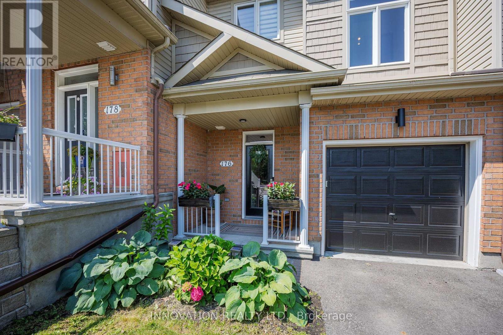 Front with landscaped garden
