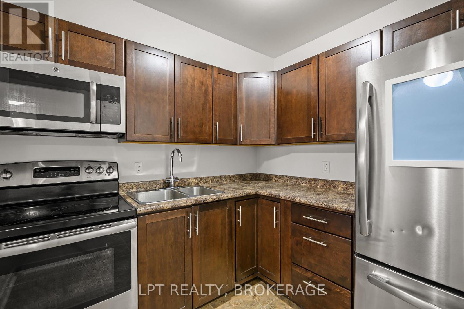 #107 310 KINGSDALE AVENUE - 6