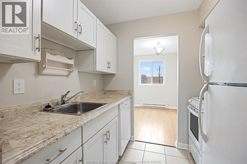 #306 3950 WYANDOTTE STREET East - 19