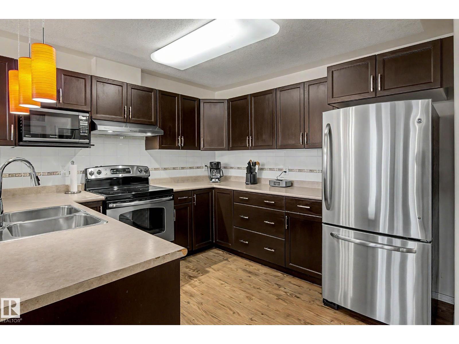 #209 237 YOUVILLE DR E NW - 6