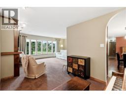 Family room - 19 Ridgedale Bay, White City, SK S4L5B1 Photo 13