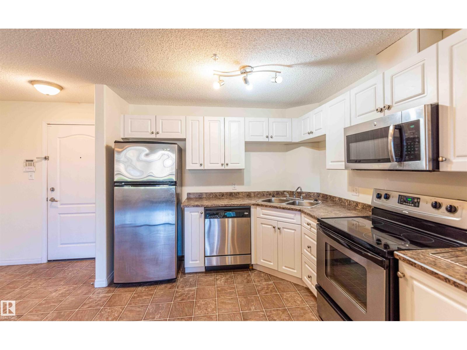 #1111 7339 SOUTH TERWILLEGAR DR NW - 4