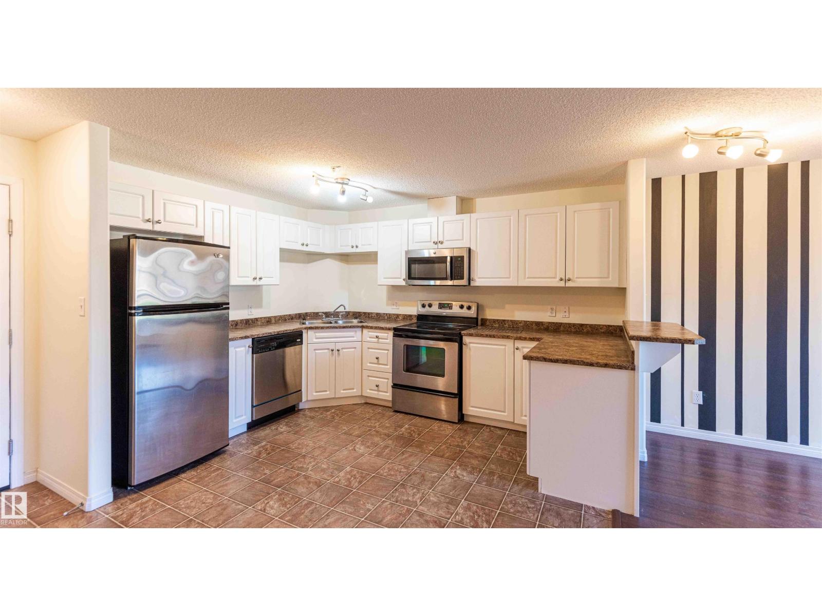 #1111 7339 SOUTH TERWILLEGAR DR NW - 3