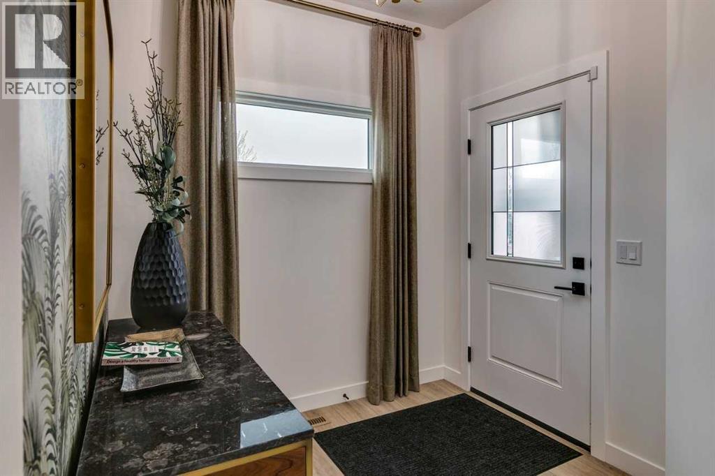 59 Creekside Rise SW, Pine Creek, Calgary photo 2
