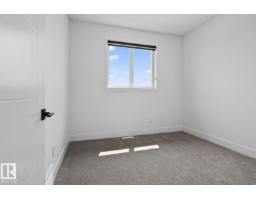 Bedroom 4 - 450 Robinson Blvd Ne, Leduc, AB T9E1P8 Photo 7