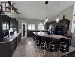 Laundry room - 15 6550 Old Alaska Highway, Fort Nelson, BC V0C1R0 Photo 8