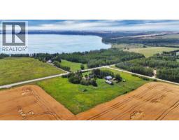Family room - 2230 Rainy Creek Road Highway, Rural Lacombe County, AB T0C0J0 Photo 6