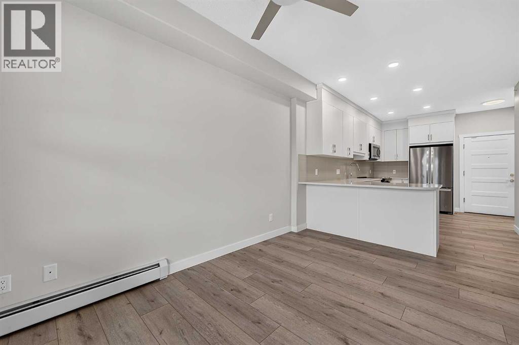 #411 55 Wolf Hollow Crescent SE - 16