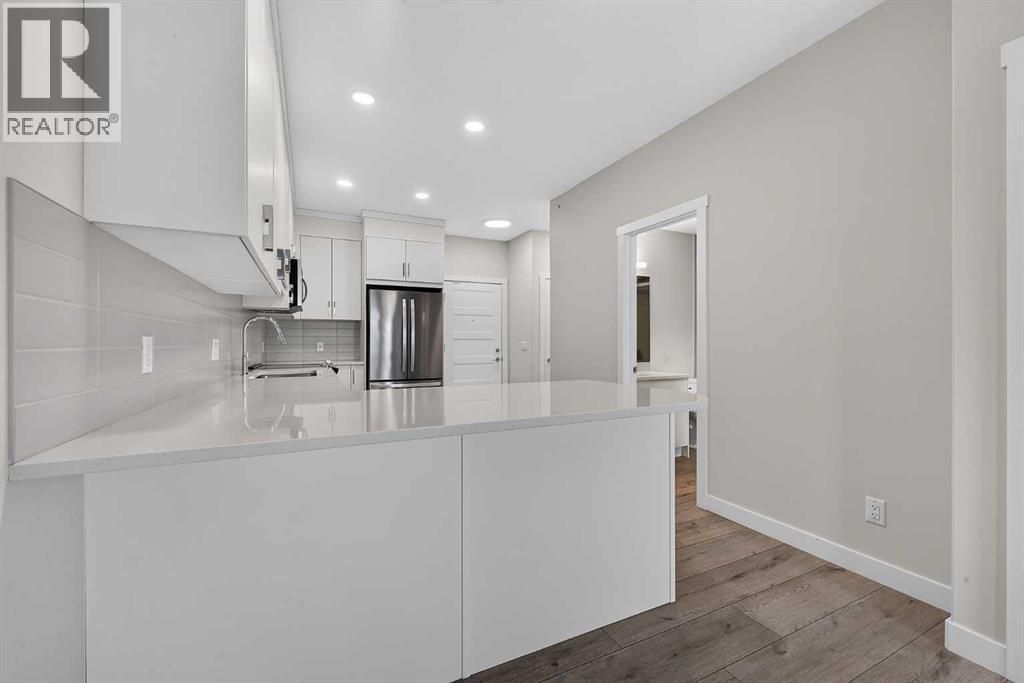 #411 55 Wolf Hollow Crescent SE - 17