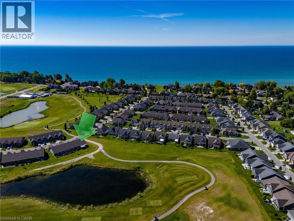 Situated on a large pond overlooking the golf course