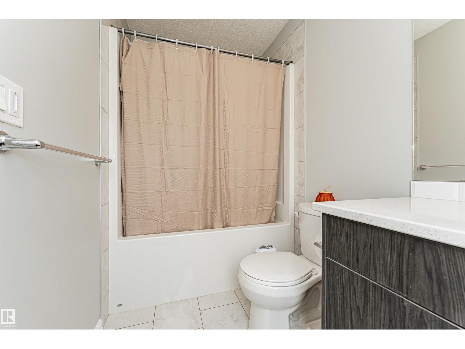 #61 215 SADDLEBACK RD NW - 33