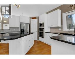 Primary Bedroom - 63 Mt Assiniboine Circle Se, Calgary, AB T2Z2N6 Photo 8