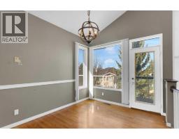 Family room - 63 Mt Assiniboine Circle Se, Calgary, AB T2Z2N6 Photo 13