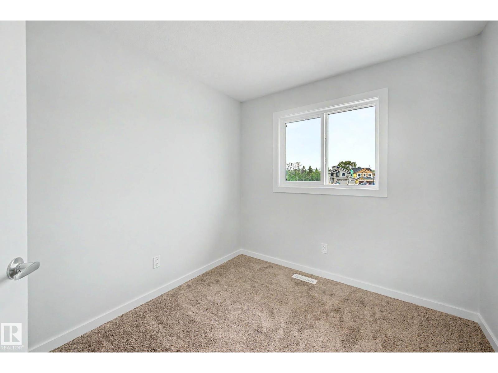 21120 25 Ave NW - 23