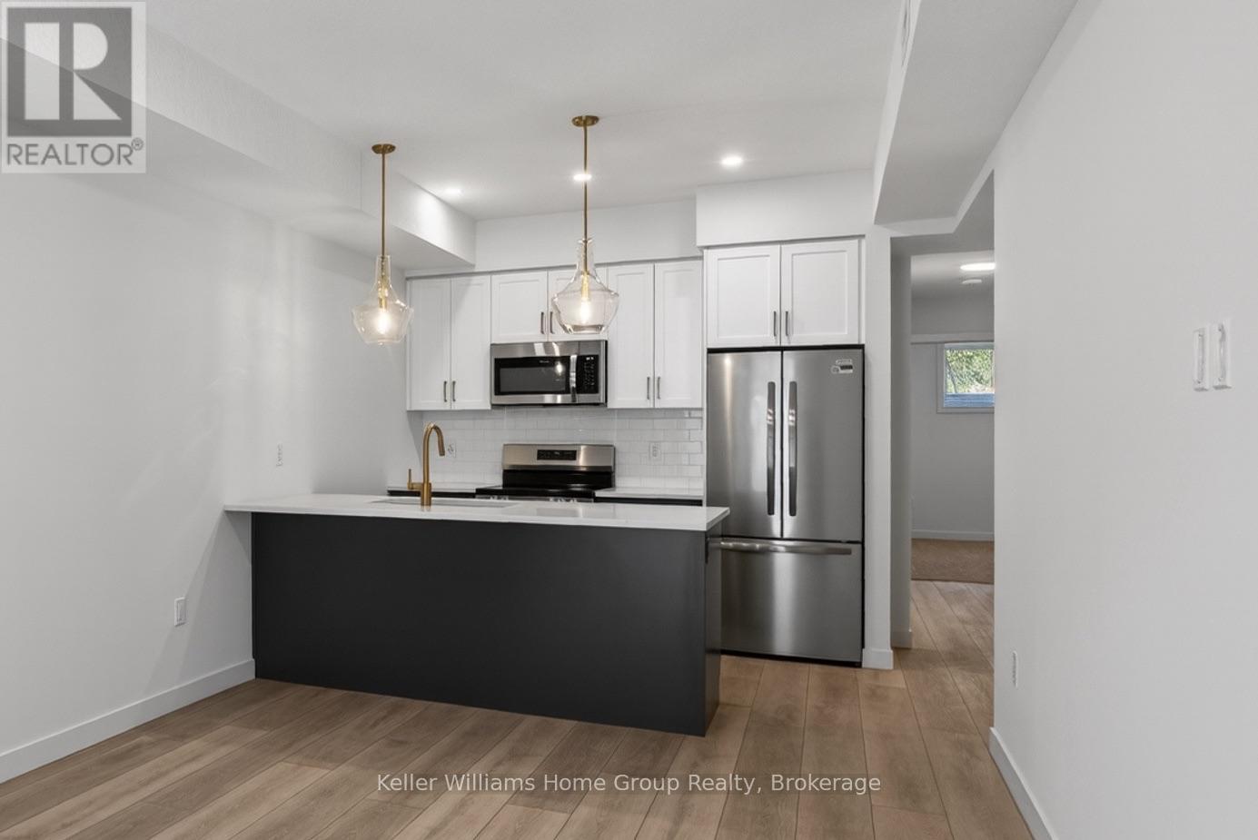 #136 824 WOOLWICH STREET - 1