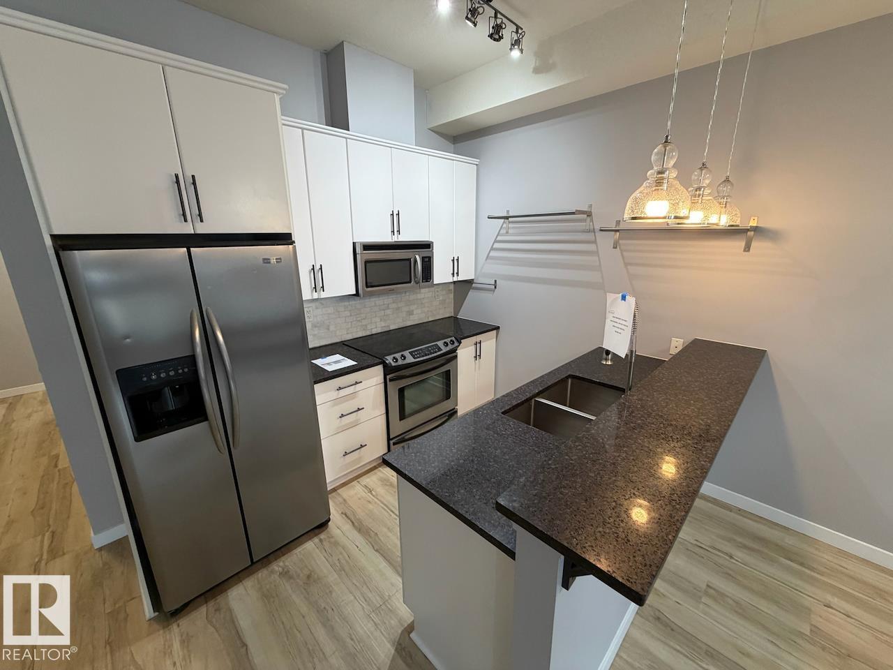 #128 10531 117 ST NW - 7