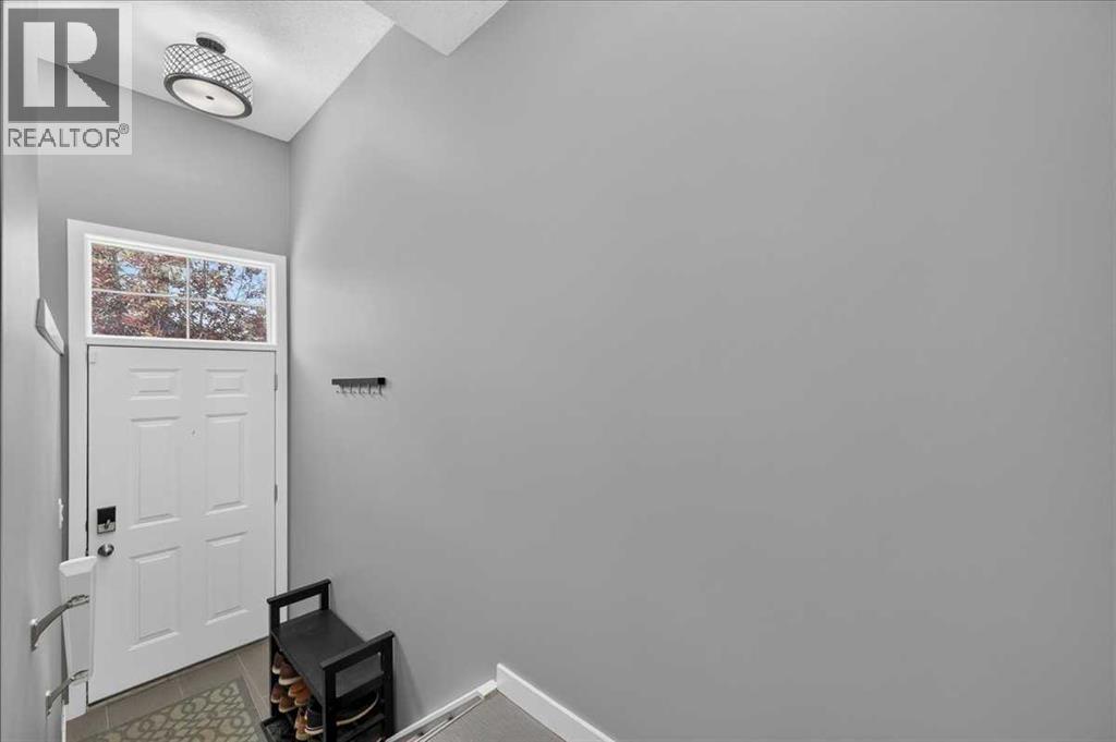 113 Tuscany Springs Gardens NW, Tuscany, Calgary photo 5
