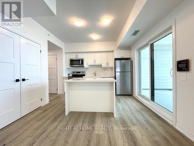 #102 15 KNEESHAW DRIVE - 1