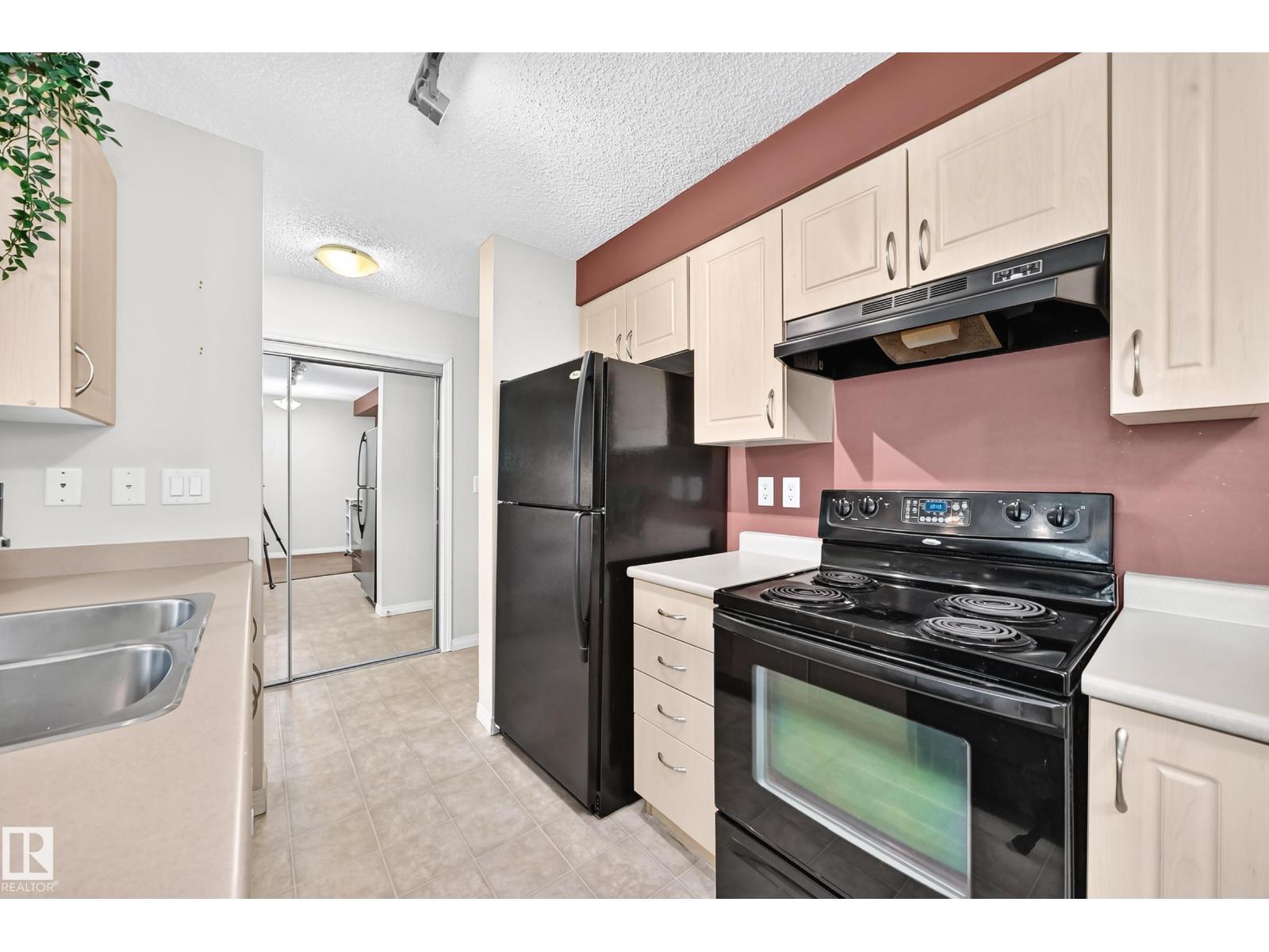 #218 13907 136 ST NW - 7