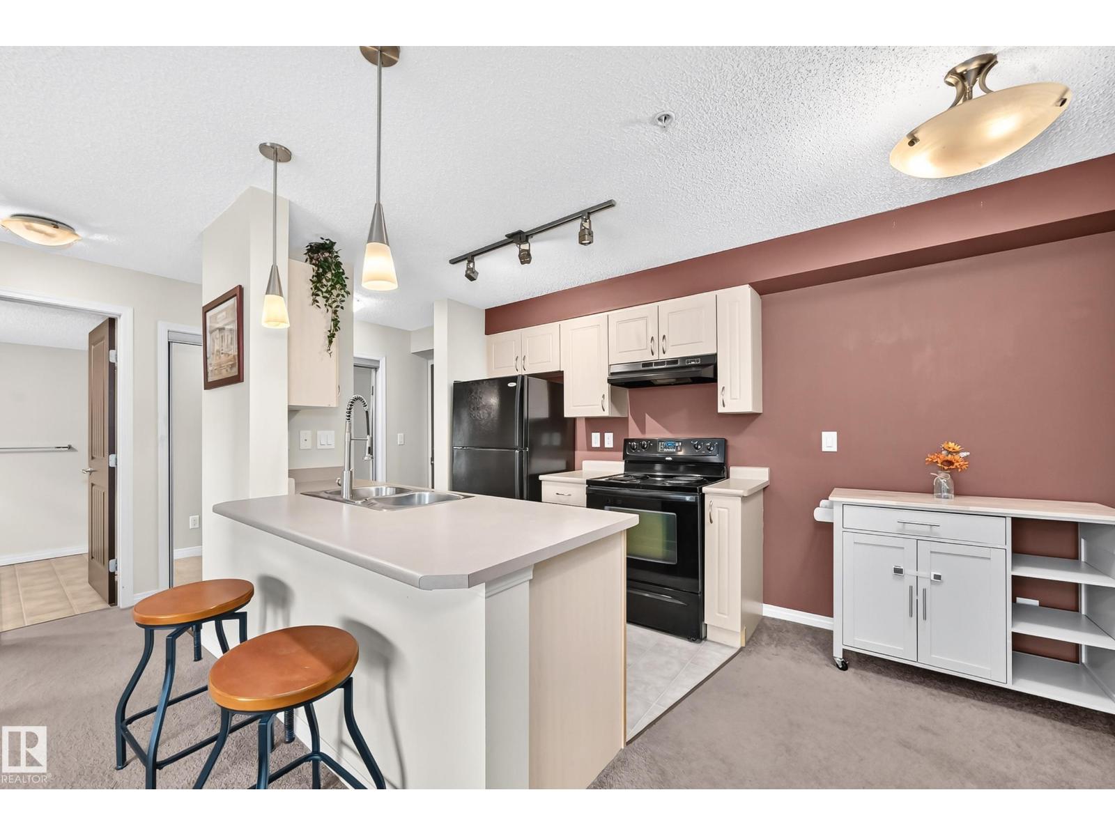 #218 13907 136 ST NW - 2