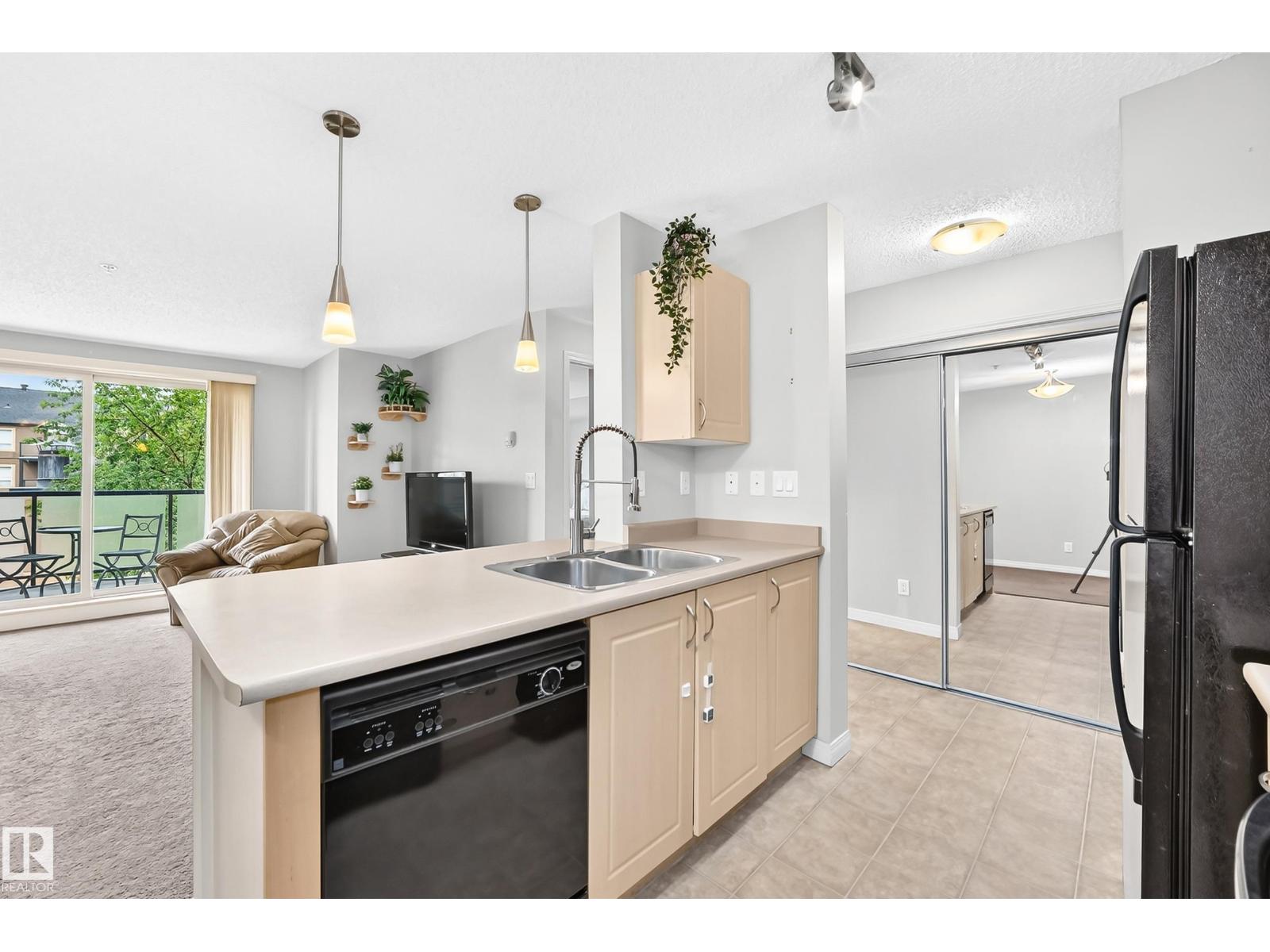 #218 13907 136 ST NW - 6