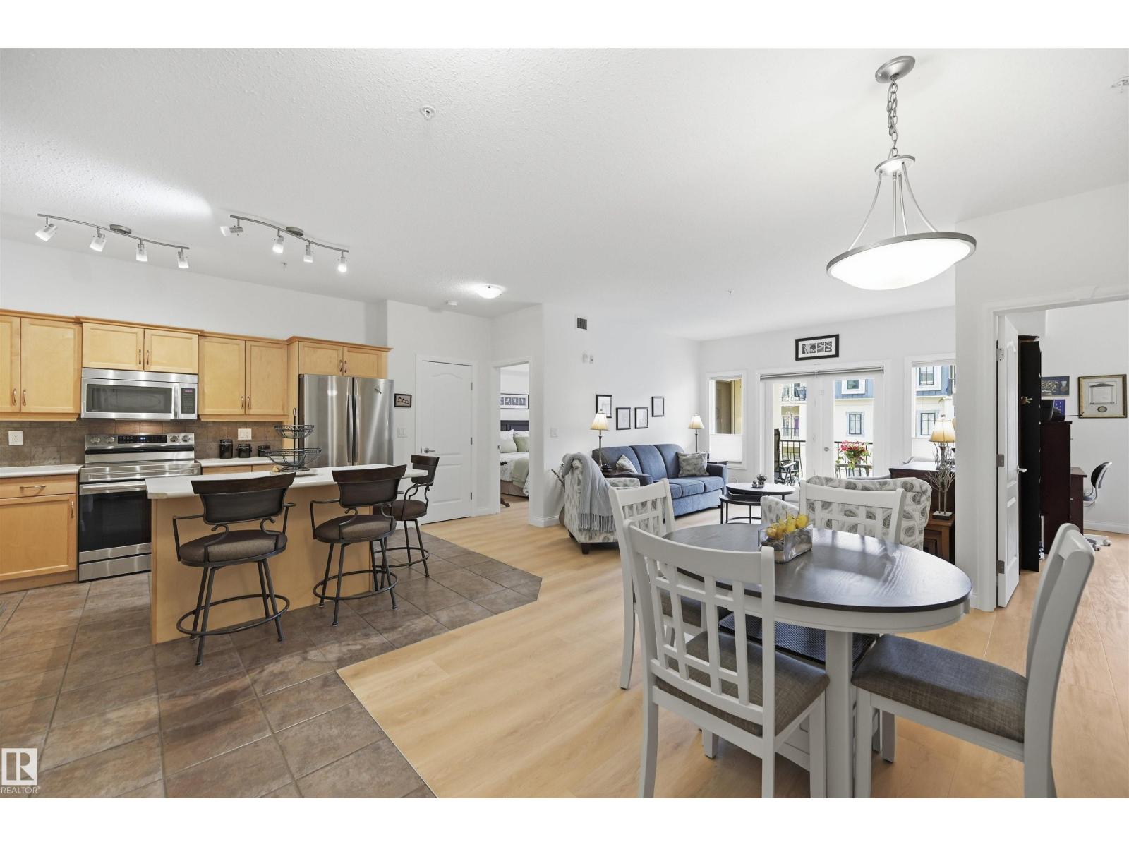 #338 1406 HODGSON WY NW - 2