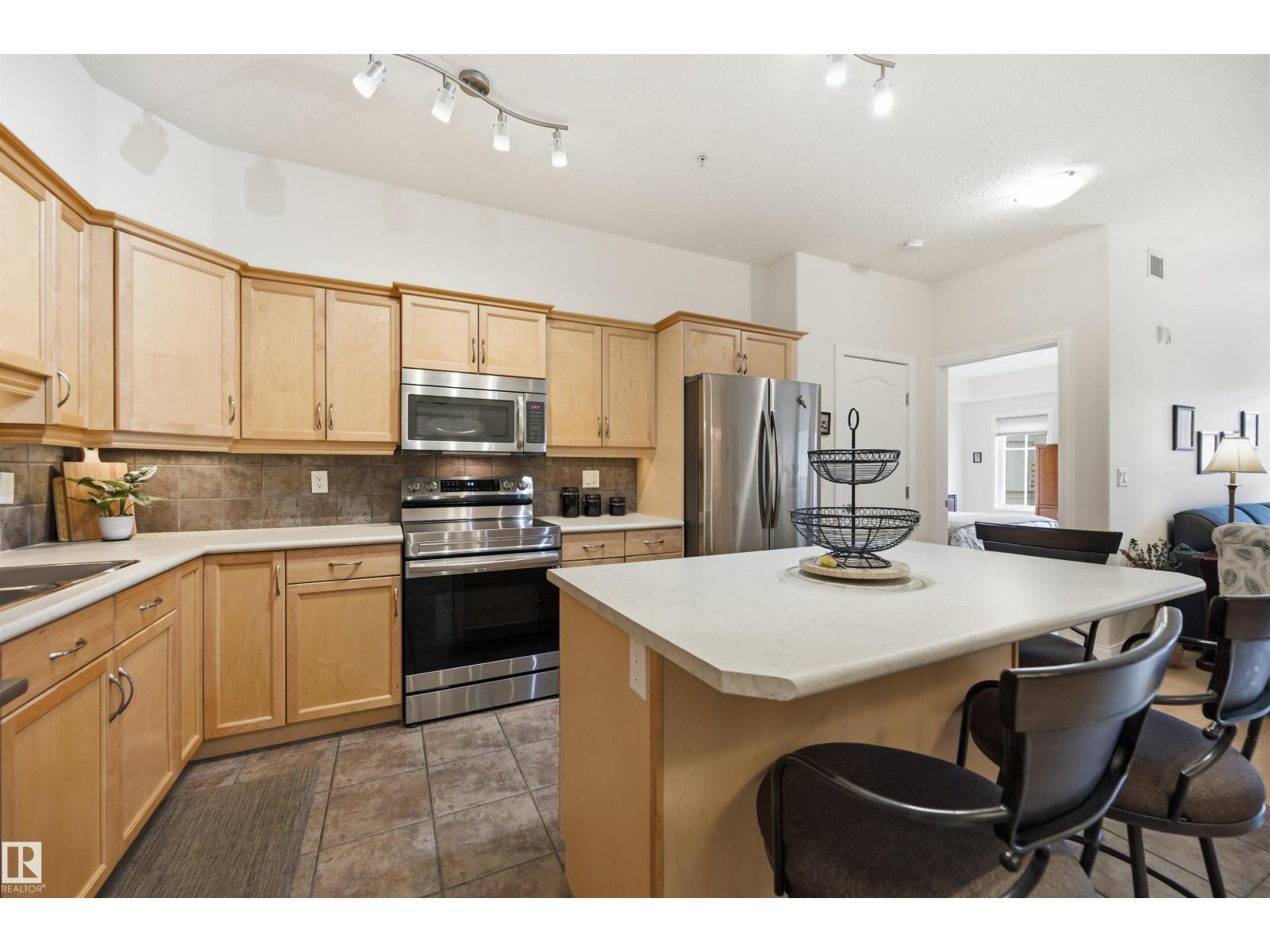 #338 1406 HODGSON WY NW - 4