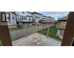 206, 80 Panatella Landing Nw, Calgary, AB T3K0K8 Photo 24