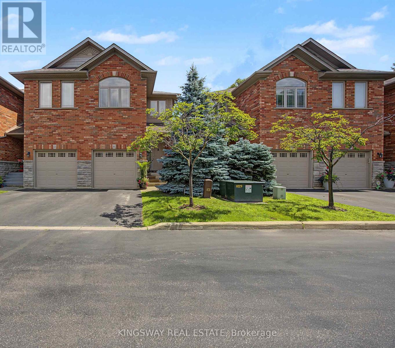 #11 218 PLAINS ROAD E - 1