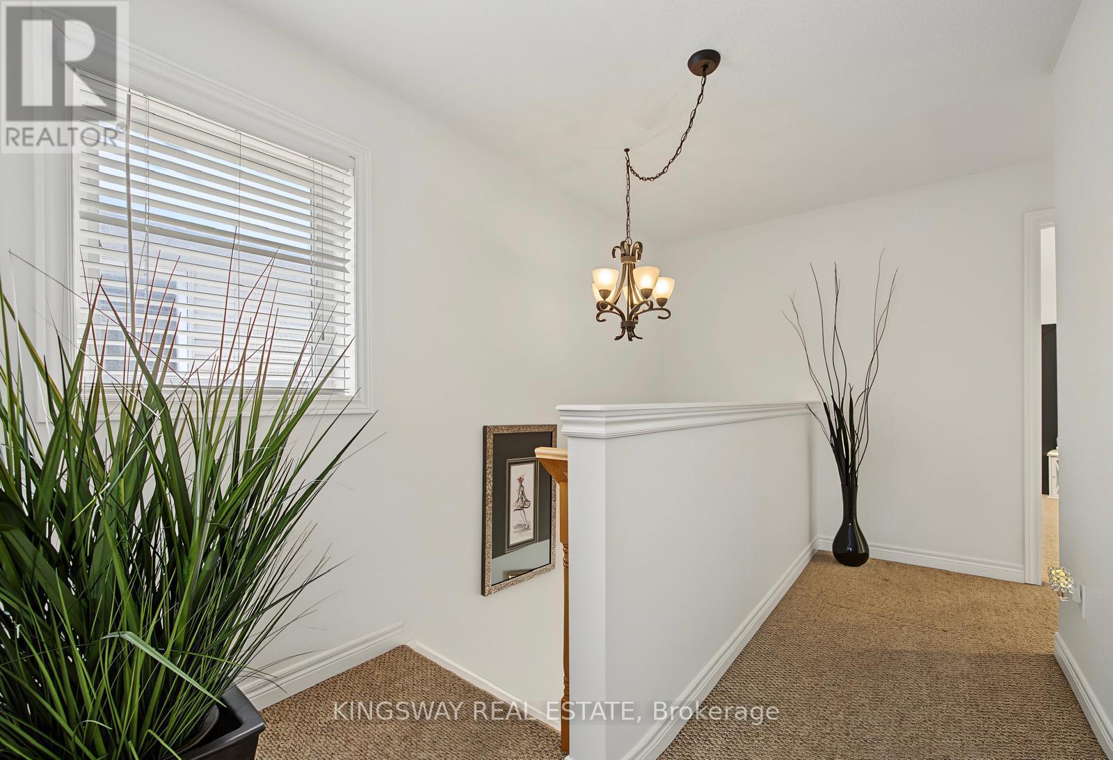 #11 218 PLAINS ROAD E - 11