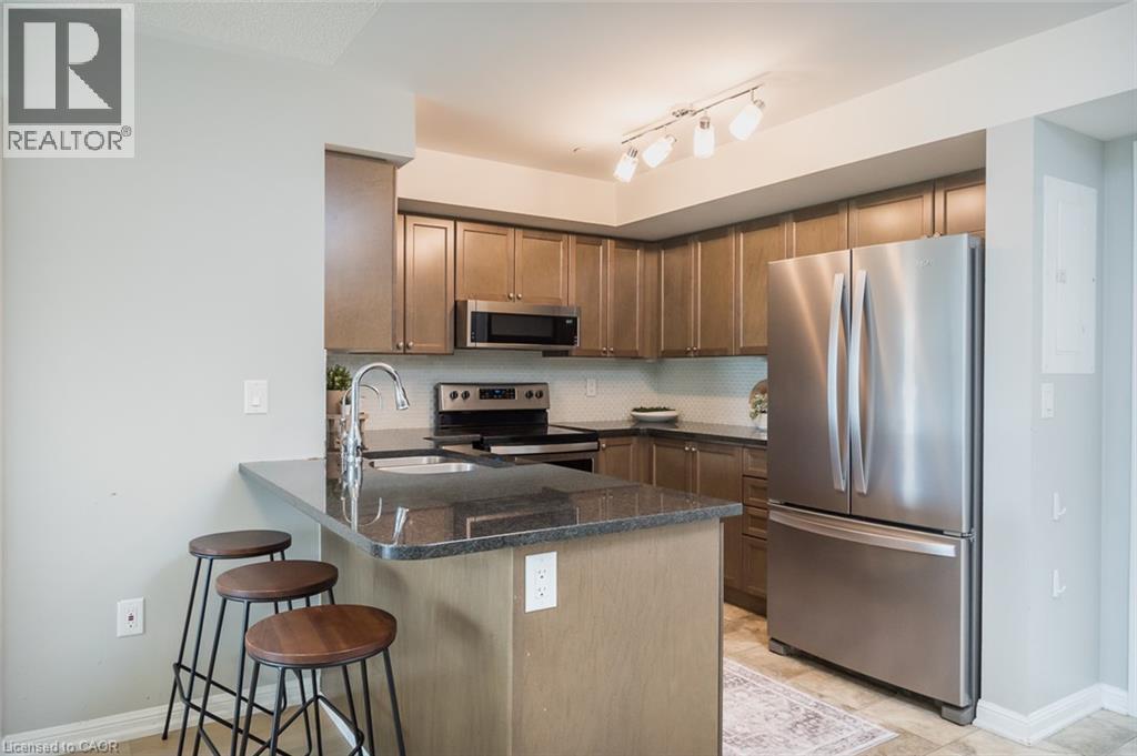 #307 1045 NADALIN Heights - Image 11